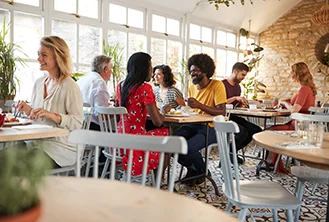 people gathered in a cafe