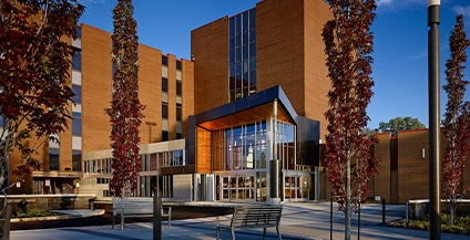 glass entrance to a brick building