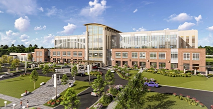 building located in front of a beautiful garden