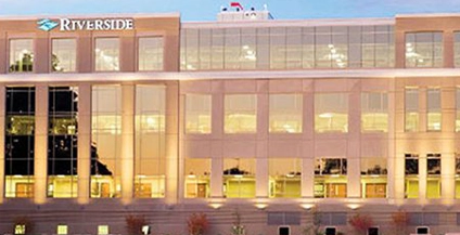 building with sign that says riverside