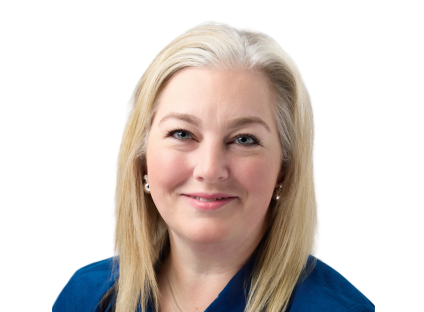 Kim Larsen, with long blonde hair smiles warmly, wearing a blue blazer and pearl earrings against a plain white background. The tone is professional and friendly.